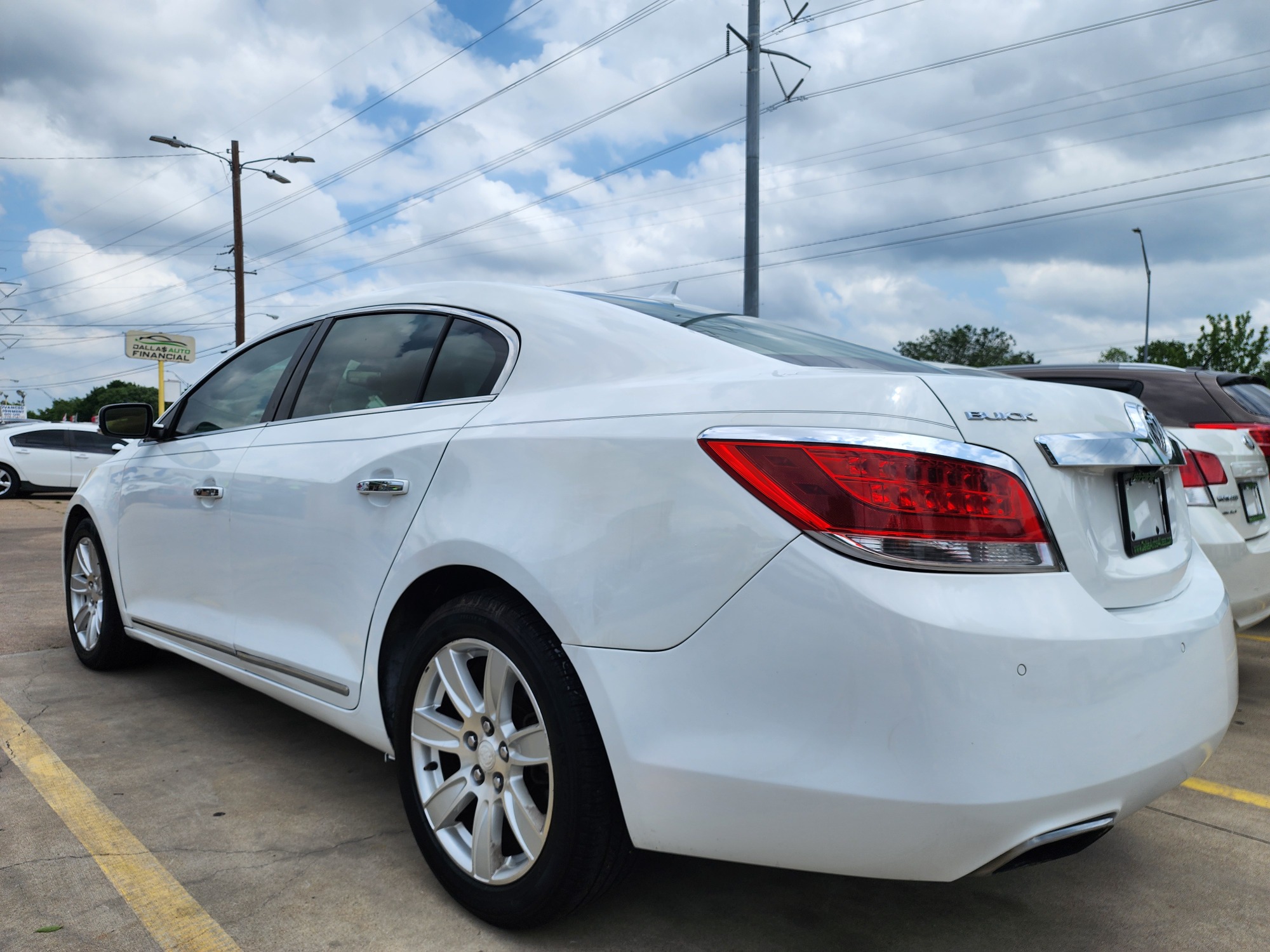 2013 WHITE /GRAY Buick LaCrosse Premium Package 2, w/Leather (1G4GF5E31DF) with an 3.6L V6 DOHC 24V FFV engine, 6-Speed Automatic transmission, located at 2660 S.Garland Avenue, Garland, TX, 75041, (469) 298-3118, 32.885551, -96.655602 - CASH$$$$$$ CAR! This is a very well cared for 2013 BUICK LACROSSE SEDAN! PREMIUM PKG! PUSH START! PANO SUNROOF! HEATED STEERING WHEEL! BLUETOOTH! Come in for a test drive today. We are open from 10am-7pm Monday-Saturday. Call us with any questions at 469.202.7468, or email us at DallasAutos4Le - Photo #2